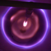 Concentric cylindrical striations in air at low pressure in the presence of an external magnetic field